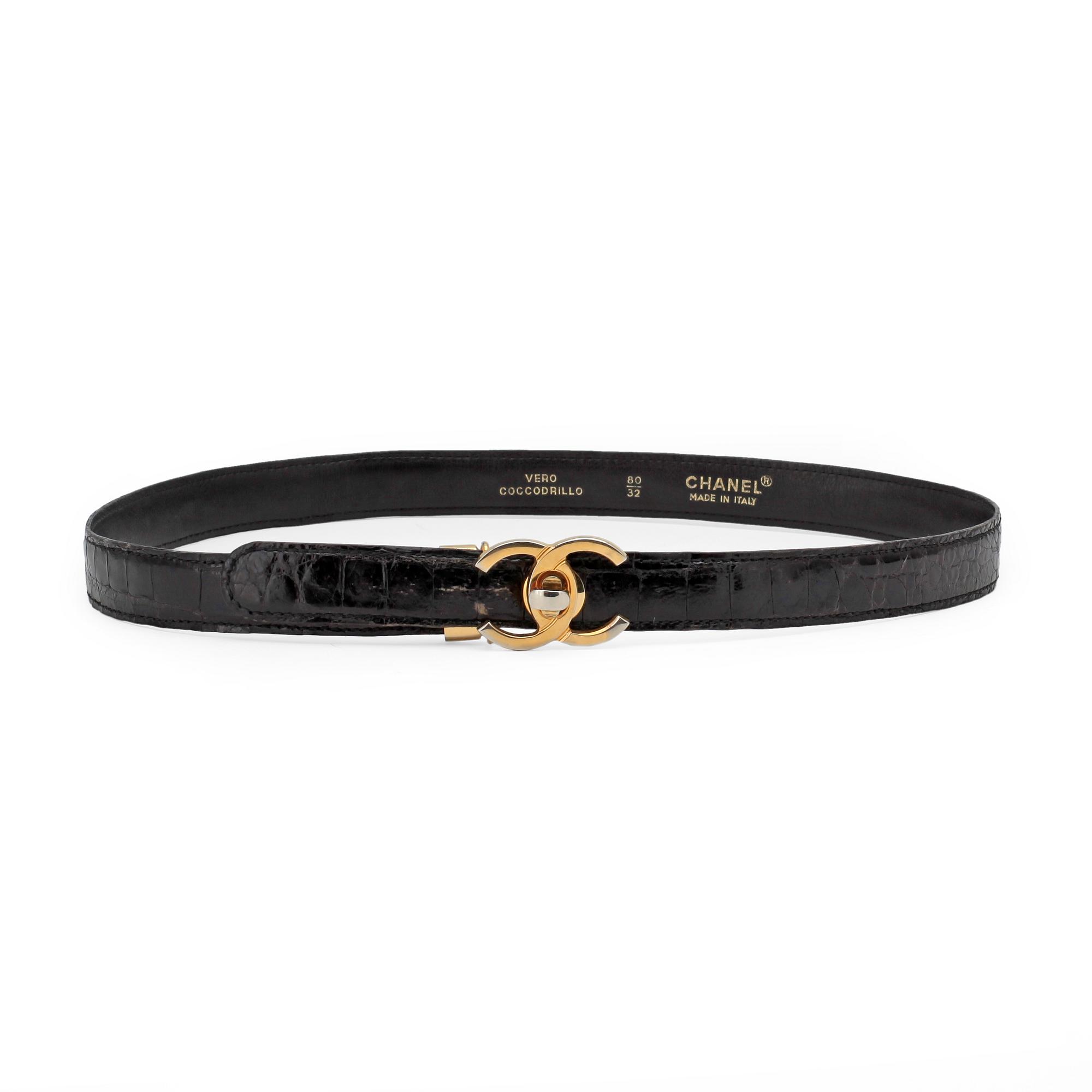 CHANEL, a black crocodile leather belt.