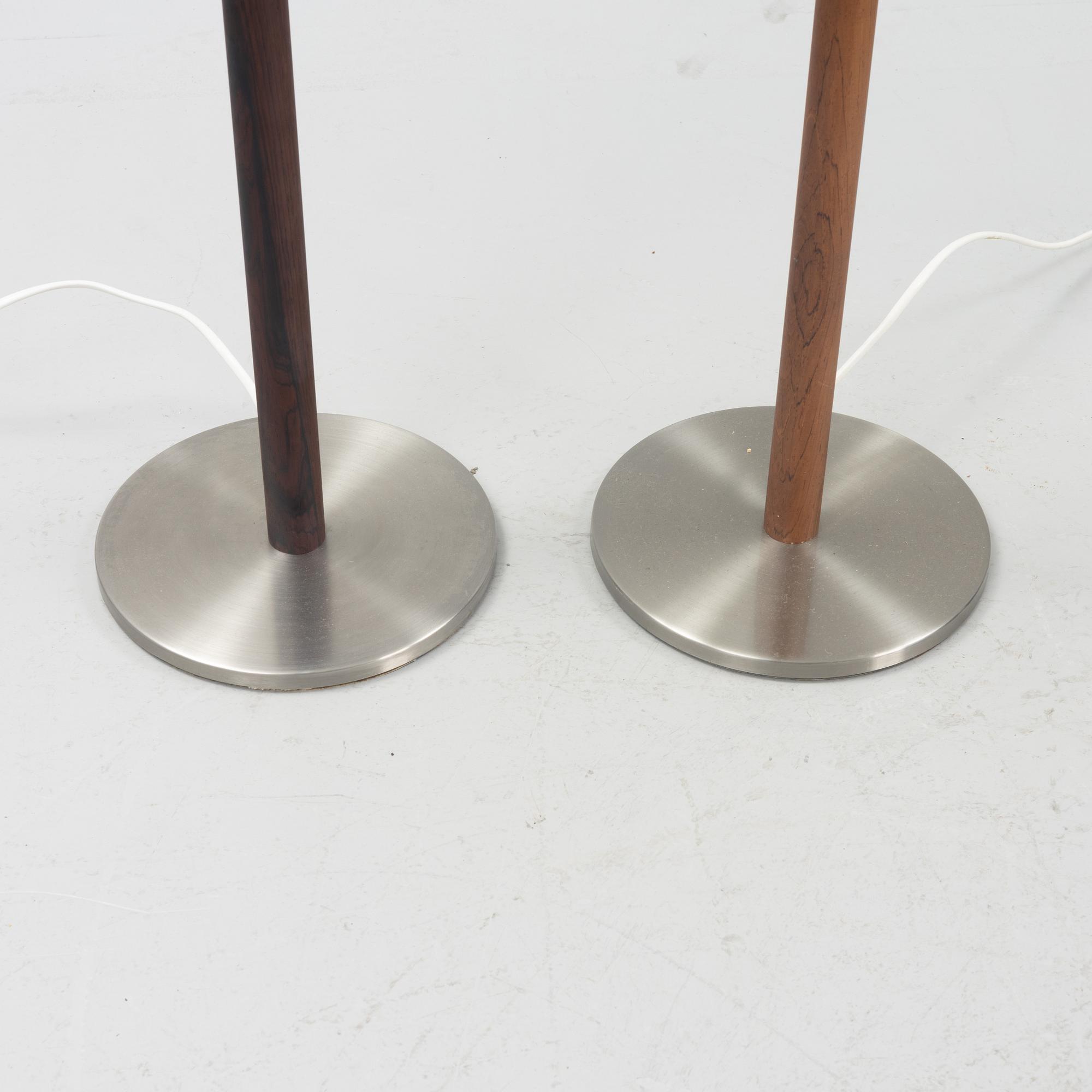 Uno & Östen Kristiansson, a pair of rosewood veneered floor lights, Luxus, Vittsjö, 1960's.