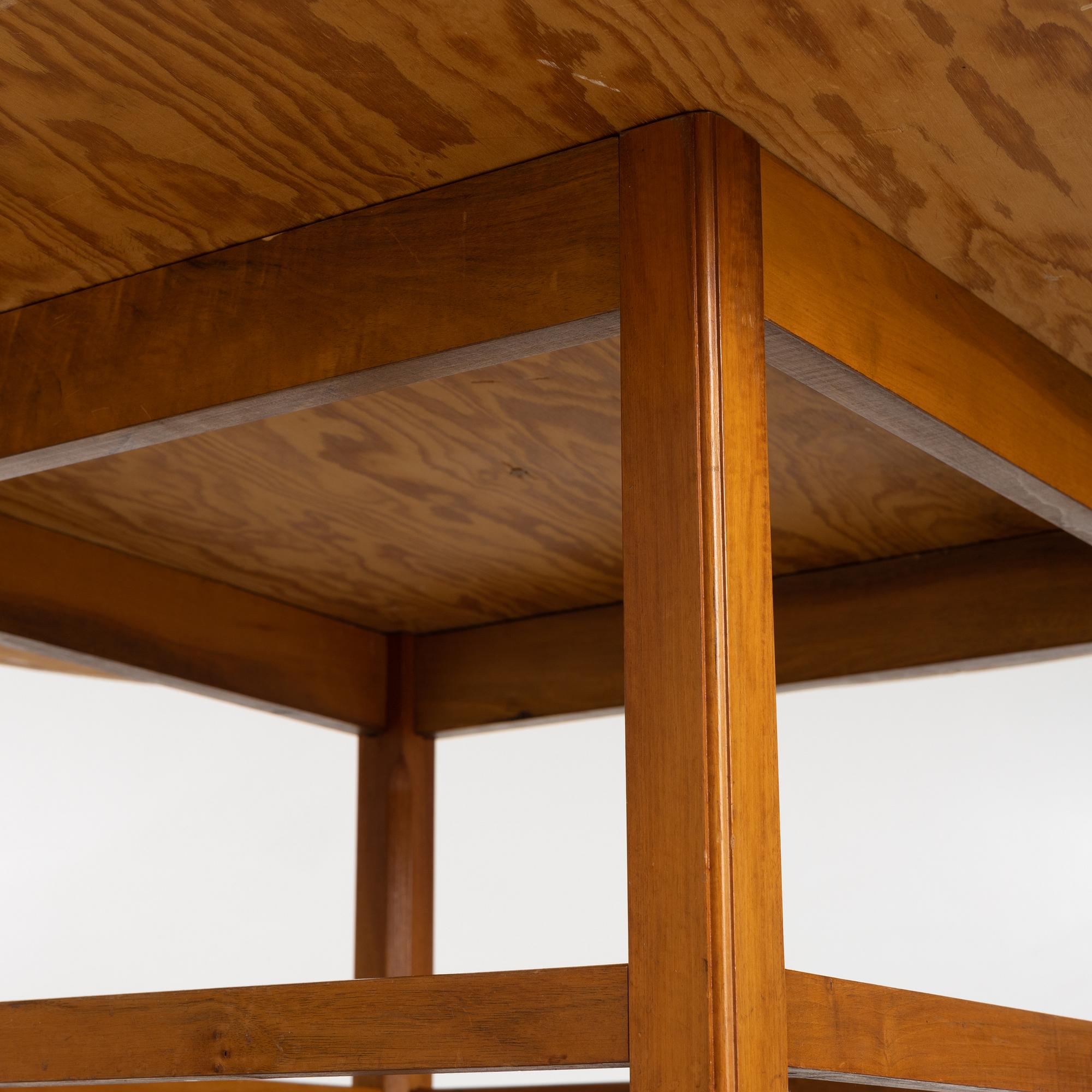 Josef Frank, a mahogany base table, map on the top, Svenskt Tenn, Sweden, model U601 (the top) & U491, 1960s-1970s.