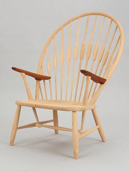A Hans J Wegner ash and teak 'Peacock chair', by PP Møbler, Denmark.