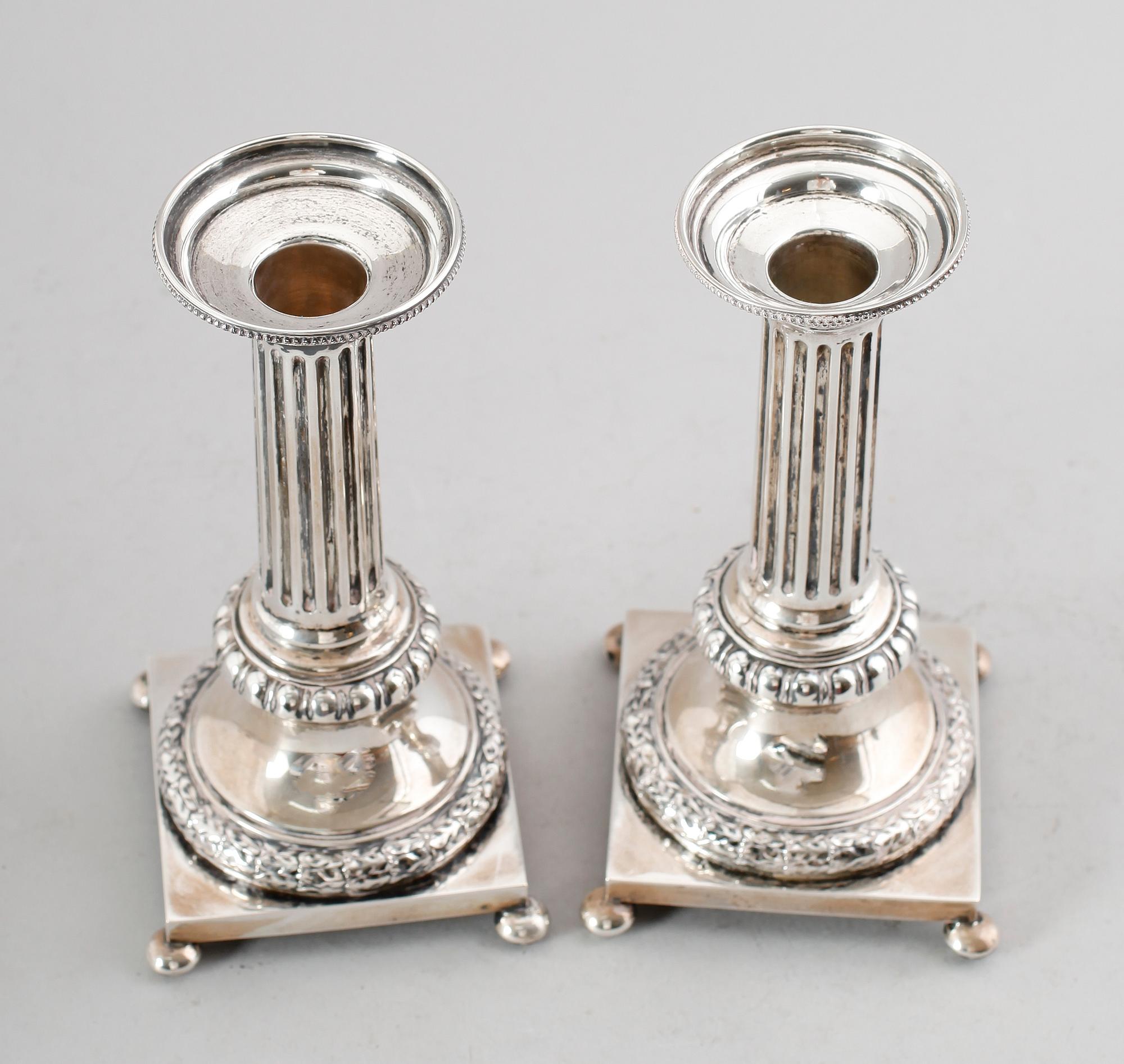 LJUSSTAKAR, 1 par, silver, CG Hallberg, Stockholm 1911/1912. Vikt ca 445 gram.