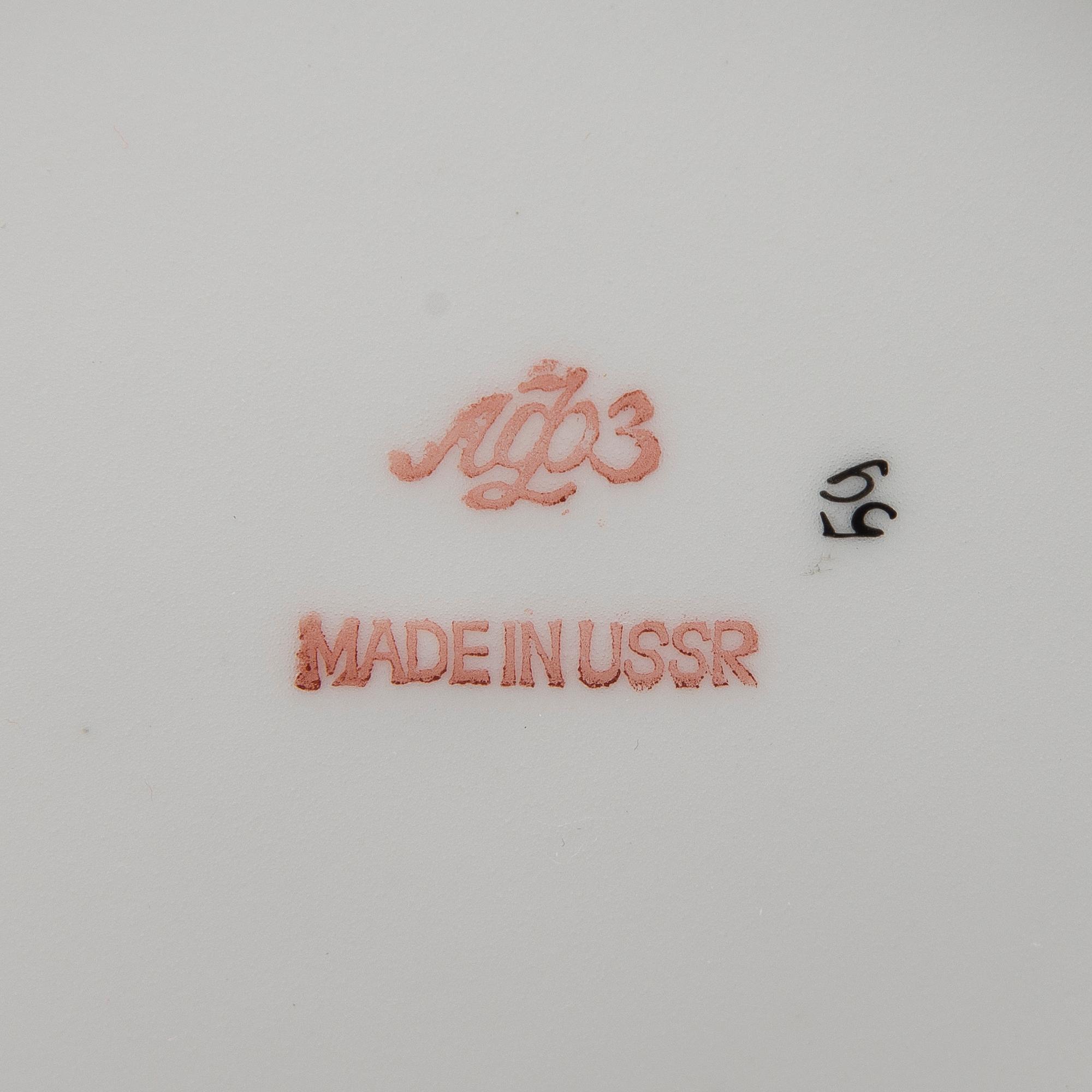 A 34-piece'Golden Garden' porcelain tea- and coffee set from Lomonosov, Soviet Union.