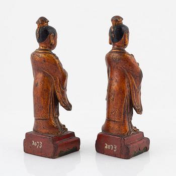 A pair of cold gilt and lacquered wooden joss stick holders, Qing dynasty, 19th Century.