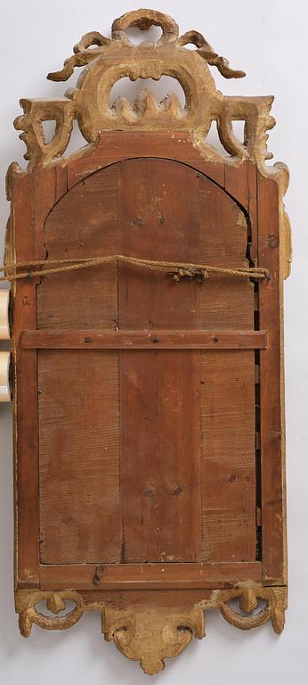 A Trasitional giltwood mirror by J. Åkerblad (master in Stockholm 1758-99).