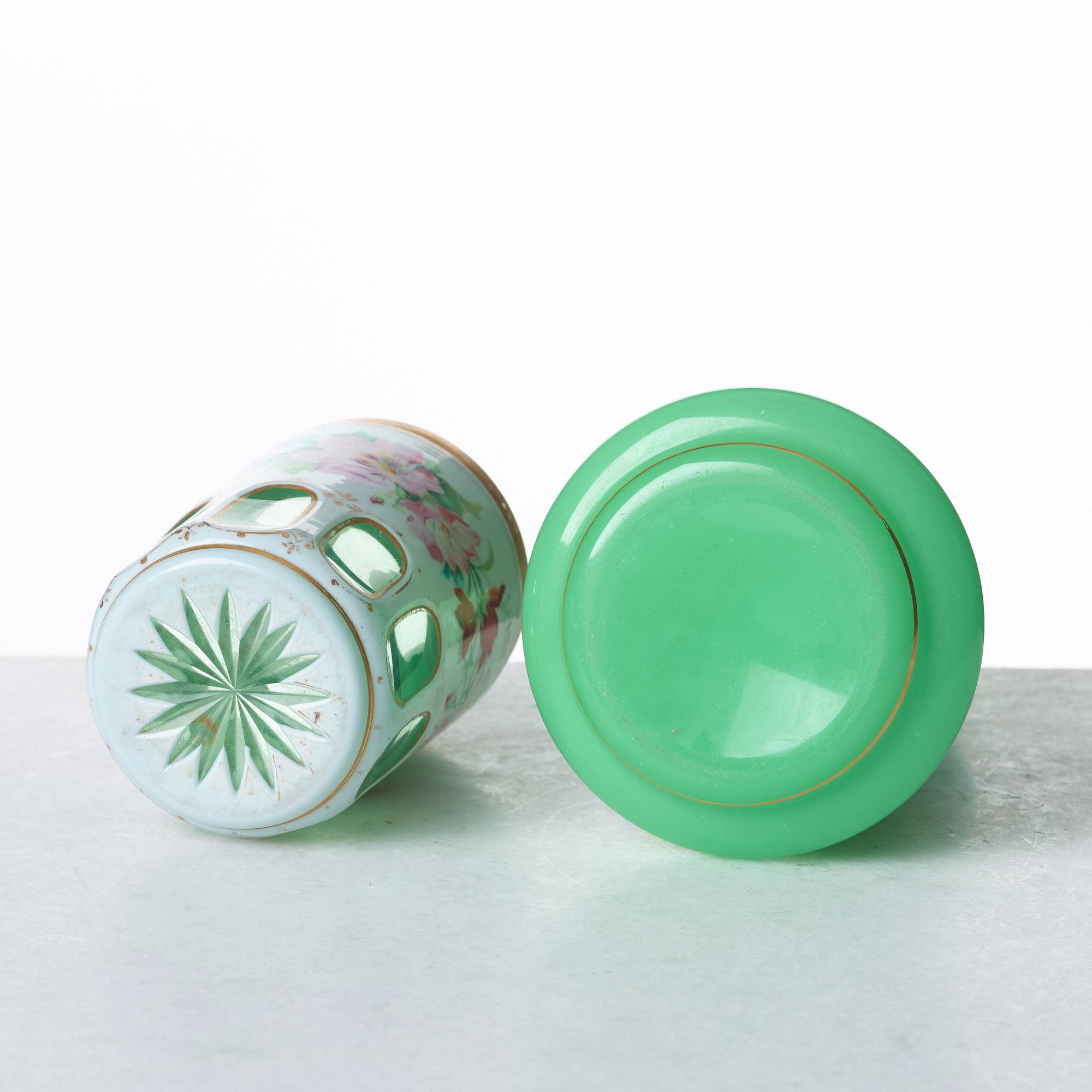 A green bottle with stopper and a beaker glass, Russia, 19th Century.