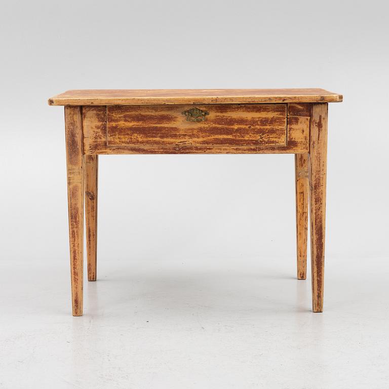 A table, 19th Century.