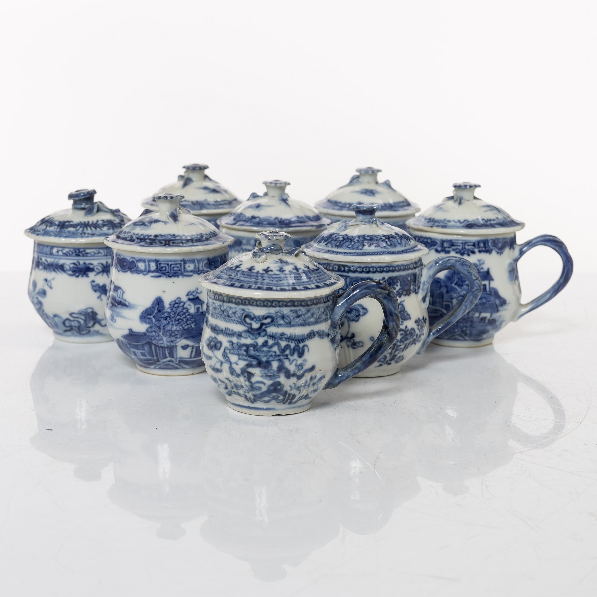 A group of eight Chinese blue and white porcelain custard cups with covers, Qing dynasty, Qianlong (1736-95).