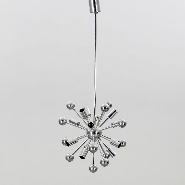 A Paul de Haan Sputnik pendant.