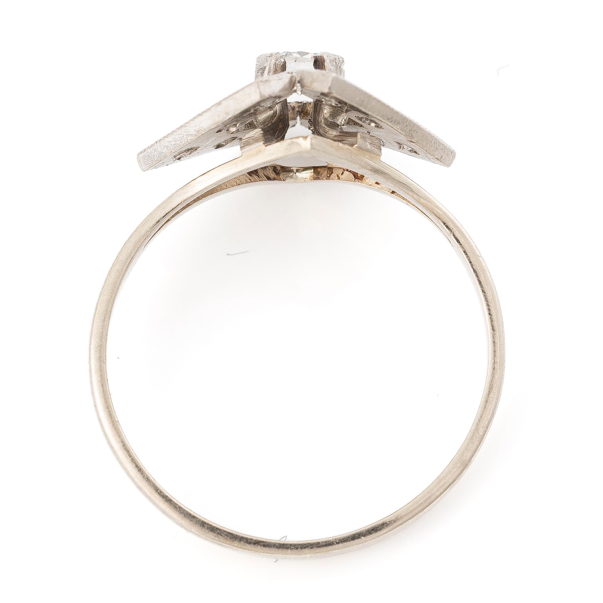 18K white gold ring set with brilliant-cut and single-cut diamonds, A. Koru 1981.