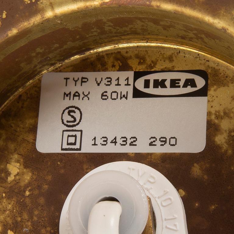 A pair of IKEA 1990s Stockholm brass wall lamps.