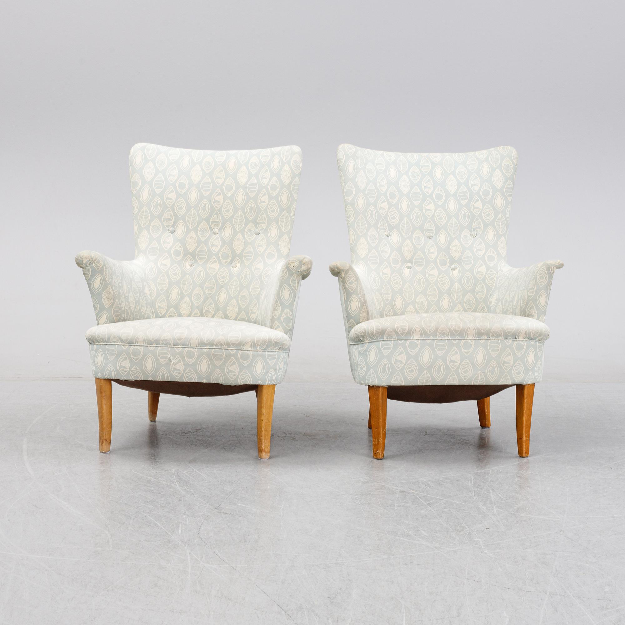 A pair of easy chairs by Carl Malmsten second half of the 20th Century.