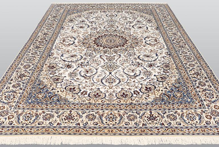 A carpet, Nain part silk so called 9LAA, ca 375 x 244 cm.