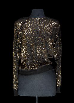 1262. A blouse by Yves Saint Laurent.