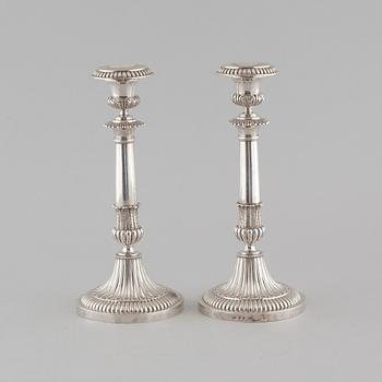 a pair of silver candlesticks, 1830.