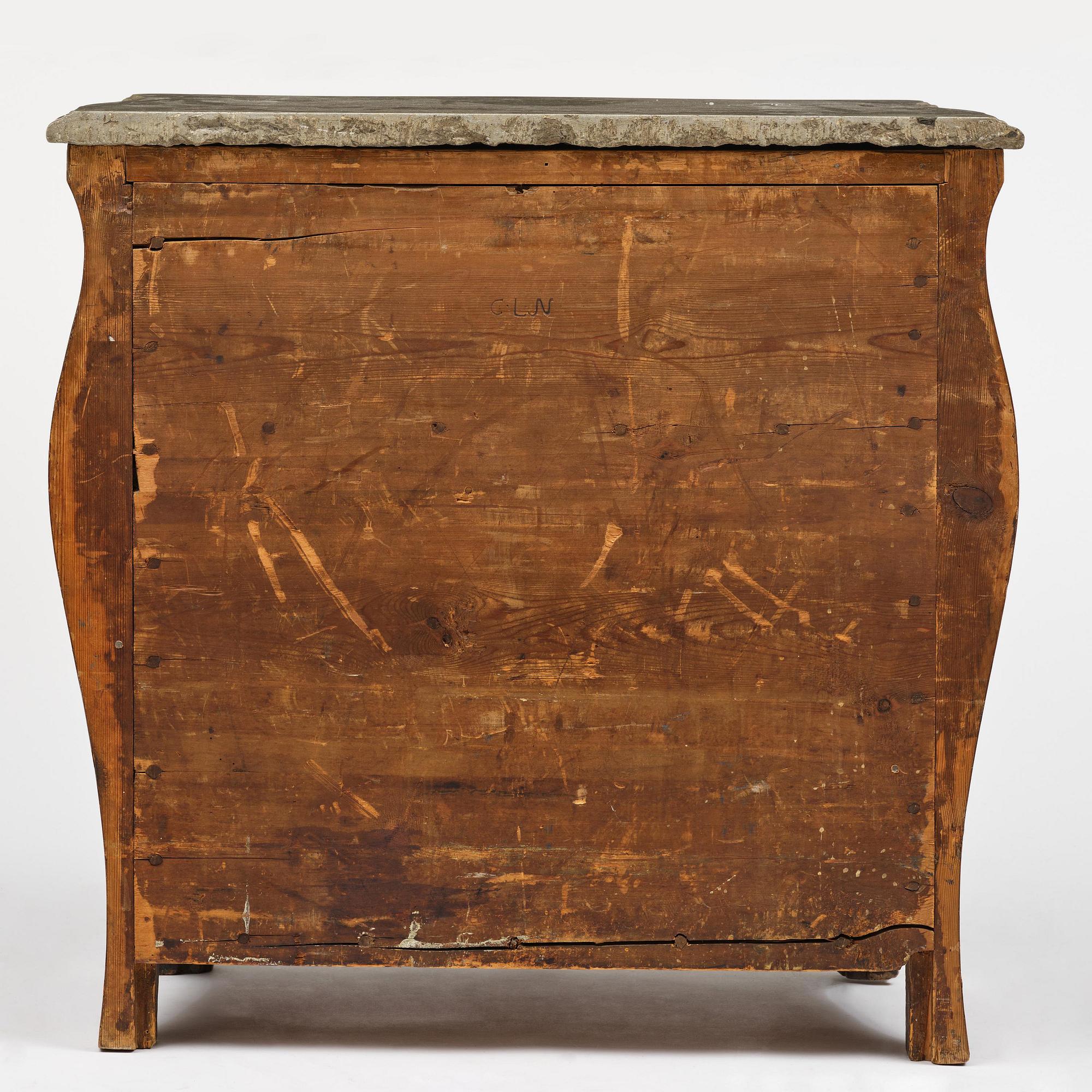 A rococo parquetry commode by C. Linning (master in Stockholm 1744-79).