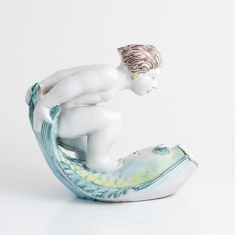 Tyra Lundgren, a faience figurine, Rörstrand, dated -30.
