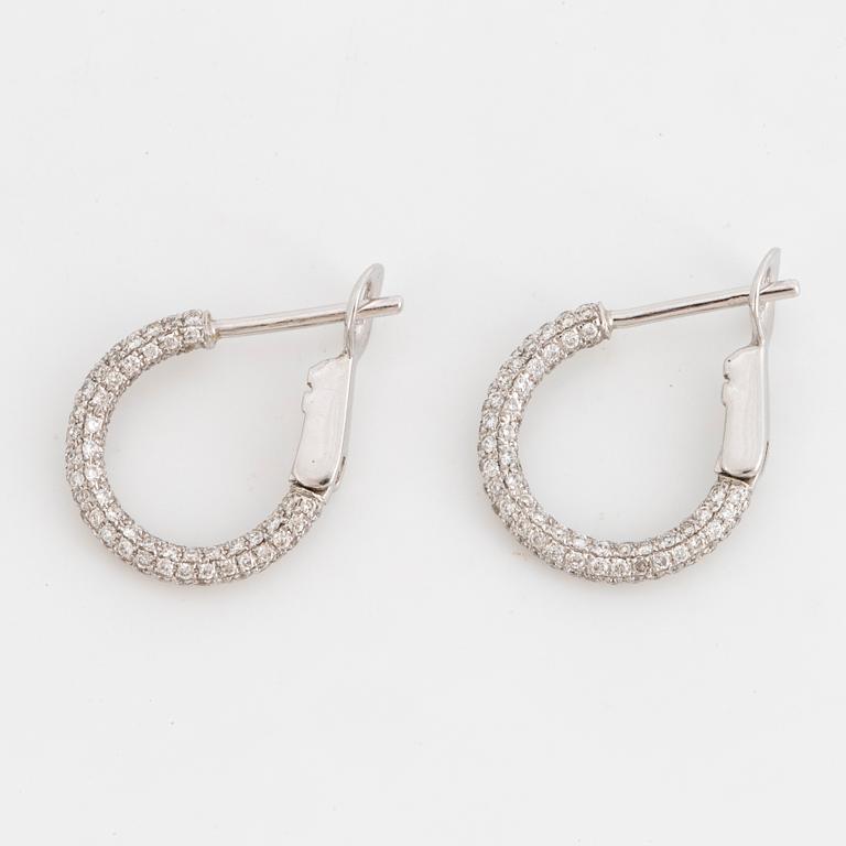 Brilliant-cut diamond pavé earrings.