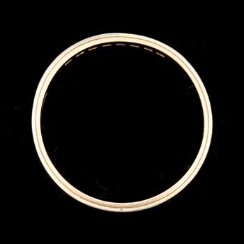 RING, 18k guld- vitguld, 8 mindre åttkantsslipade daimanter, ca 0.08ct. Vikt ca 3,5g.
