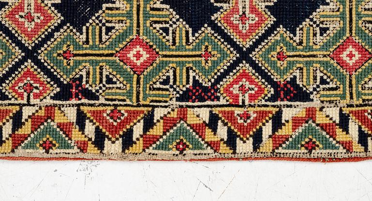 An embroidered carriage cushion, c. 98,5 x 41 cm, South West Scania, circa 1800-1830.
