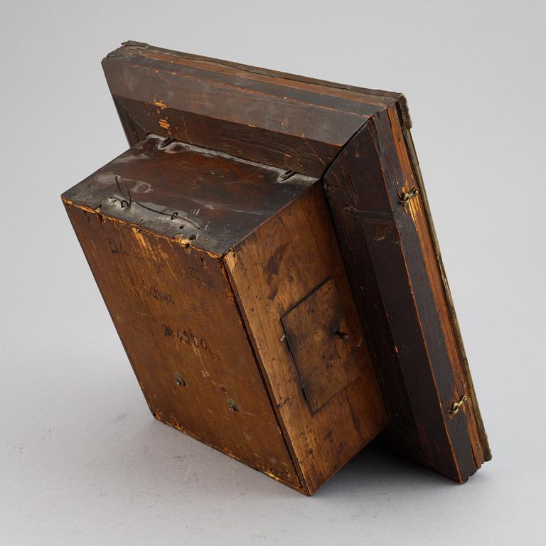 A Schwarzwald area wall pendulum clock with mechanical eye-movment, mid 19thcentury.