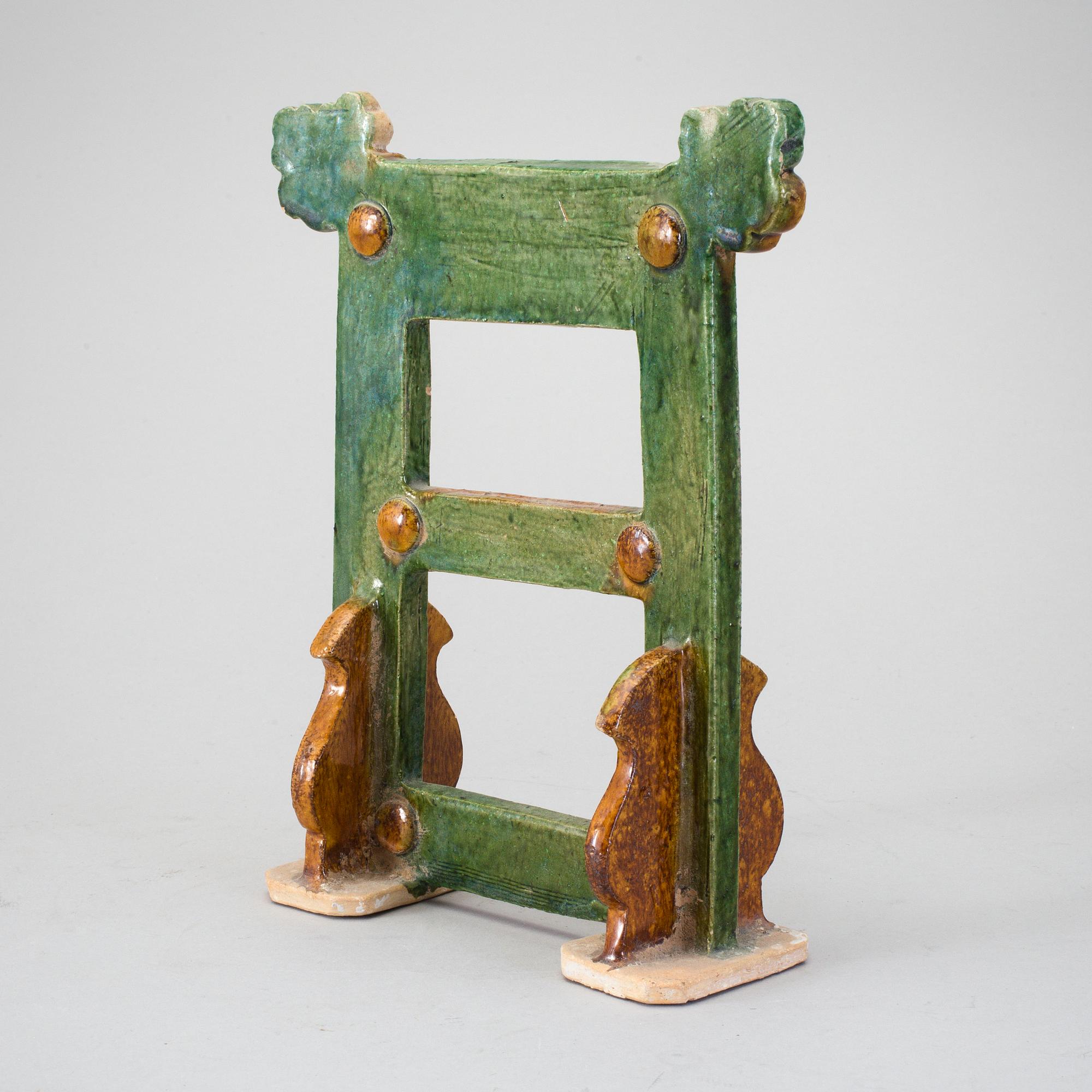 A green an yellow glazed portal/stand, presumably Ming dynasty.