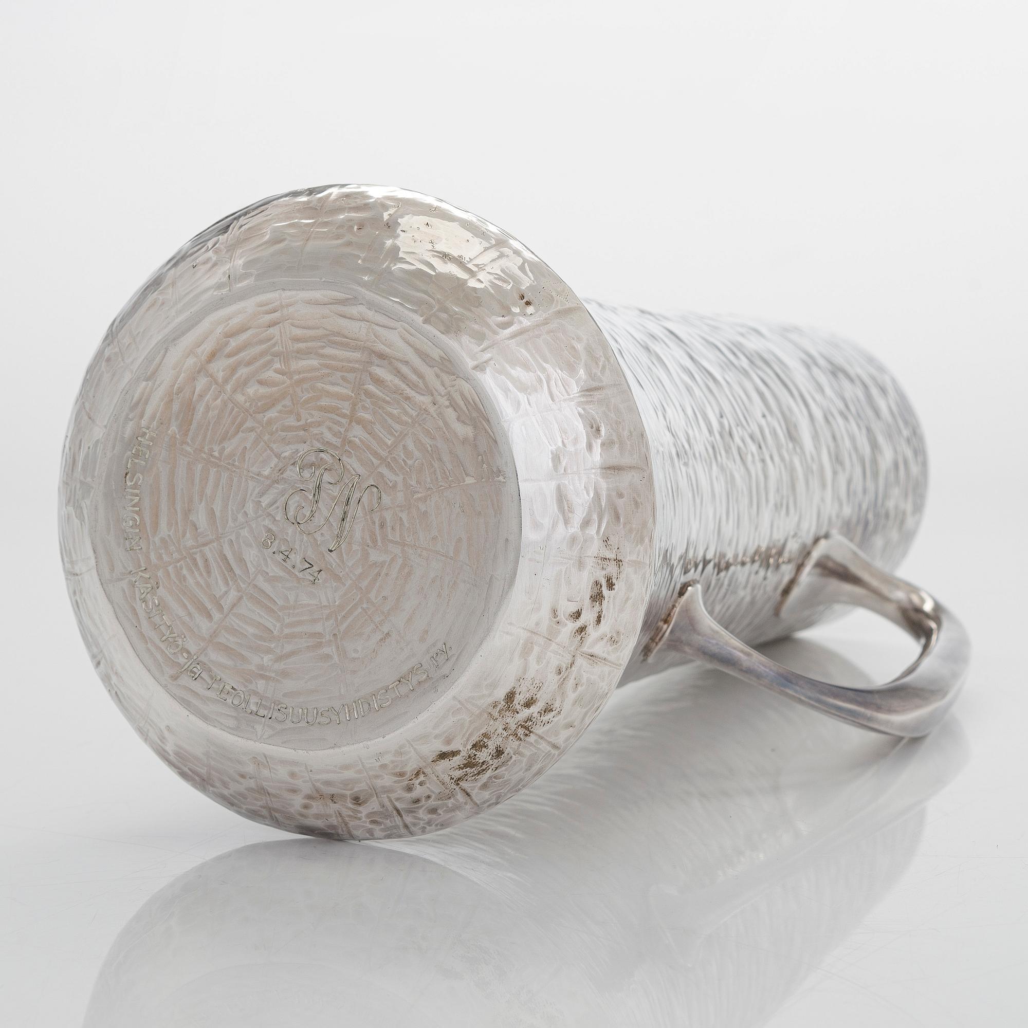 Tapio Wirkkala, a sterling silver pitcher with eight beakers, Hämeenlinna Finland 1973-1978.