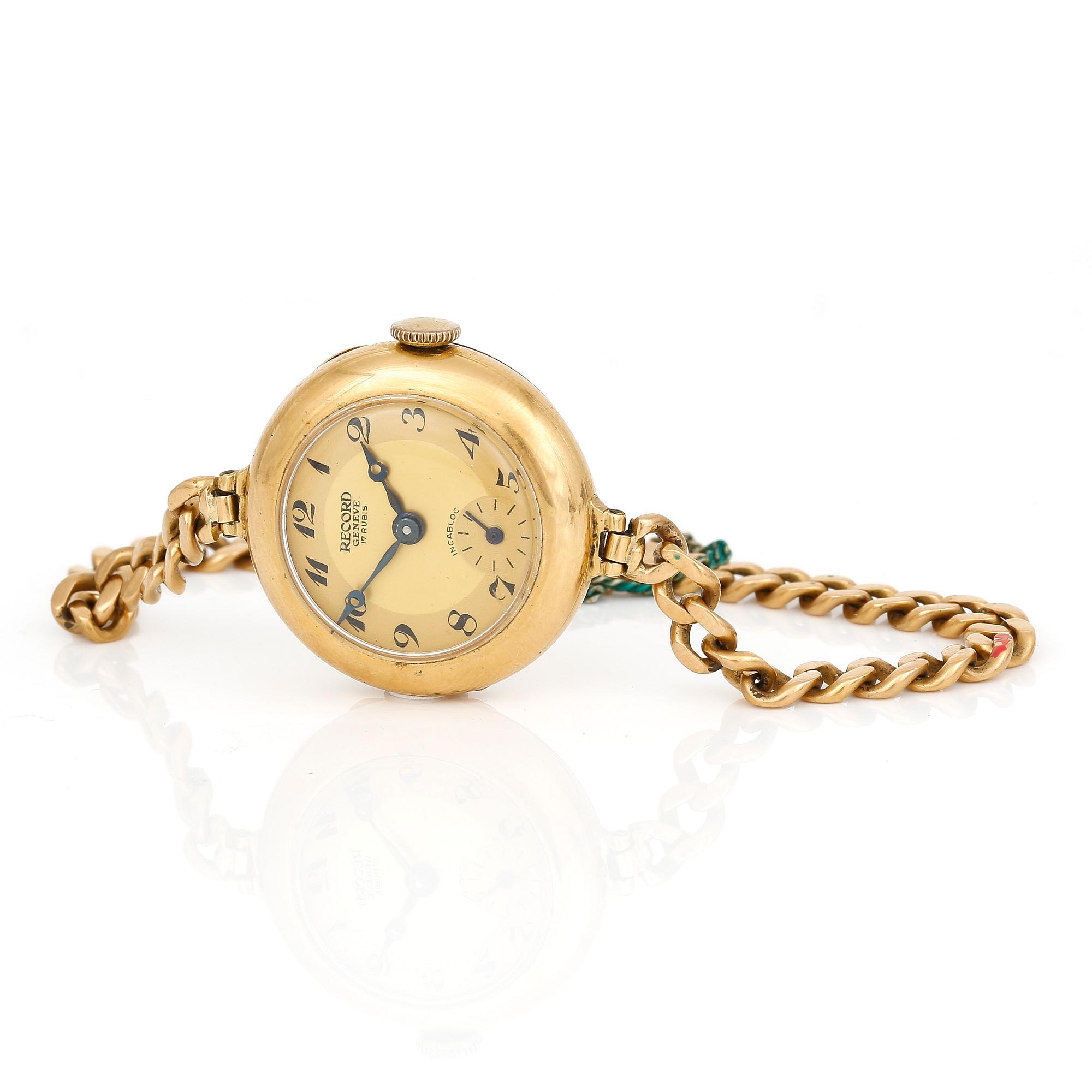 ARMBANDSUR, 18 k guld, dam, Record Watch Co, Genève. Kedjans vikt ca 7 g. 1900-talets andra hälft.