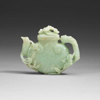 A carved jadeit tea-pot with cover, presumably late Qing dynasty (1644-1912).