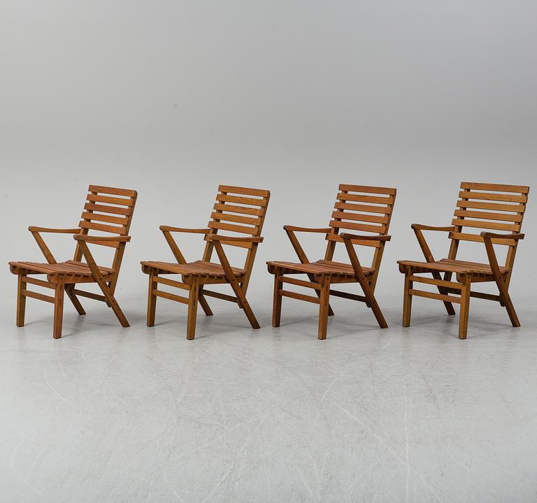 A Carl Malmsten "Bergshamra" garden table and four chairs, first half of the 20th century.