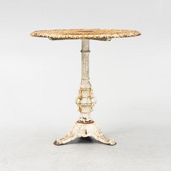 A cast iron garden table, first half of the 20th Century.
