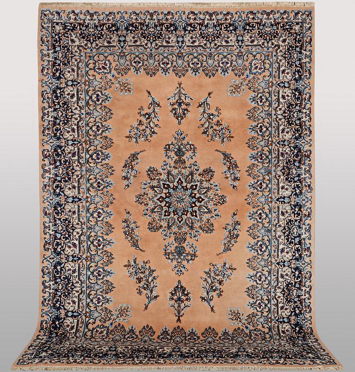 A carpet, Kerman, ca 352 x 188 cm.
