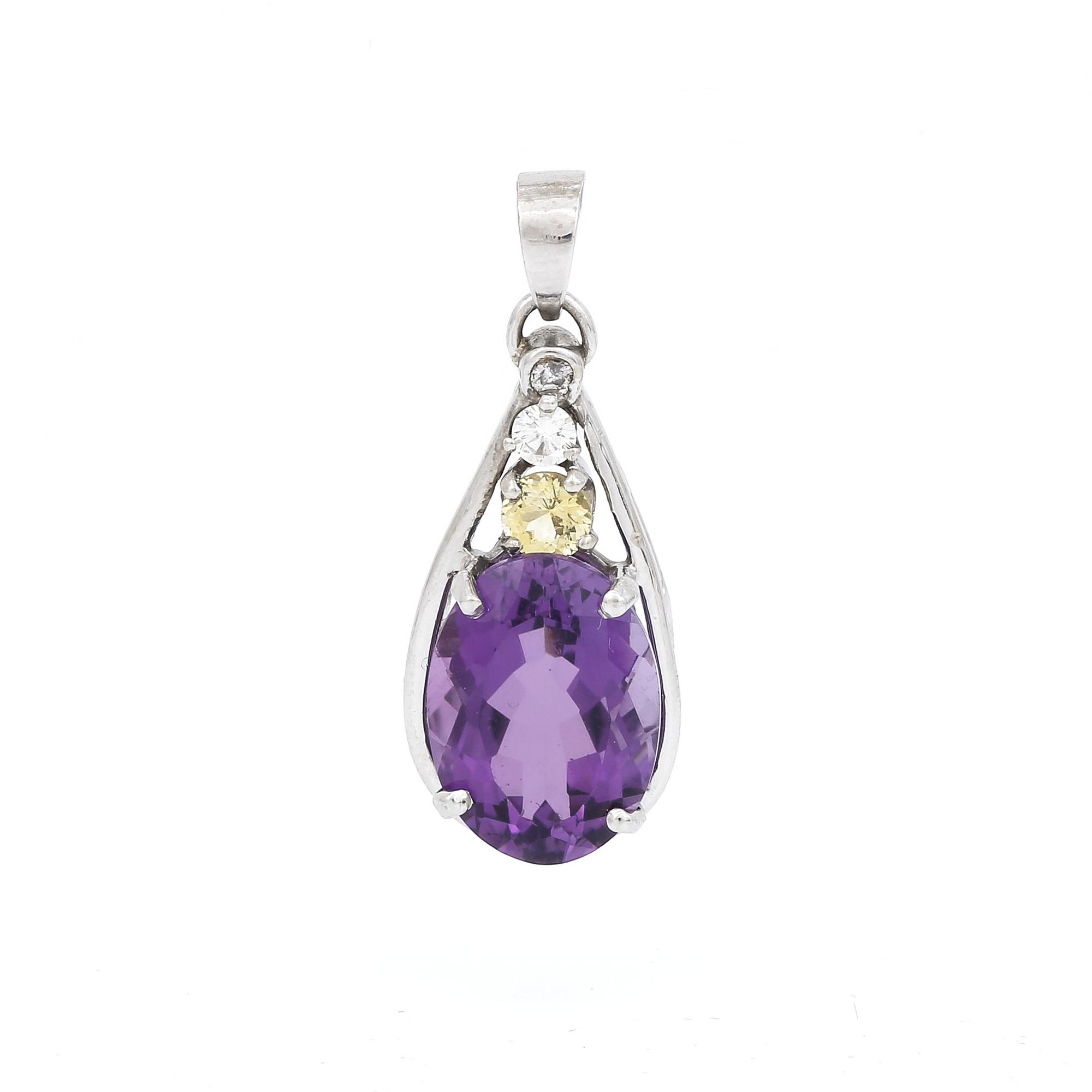 HÄNGE, vitguld 14K, oval ametist, ca 8.00 ct, citrin ca 0.40ct samt briljantslipade diamanter totalt ca 0.10 ct. Ca 3 g.