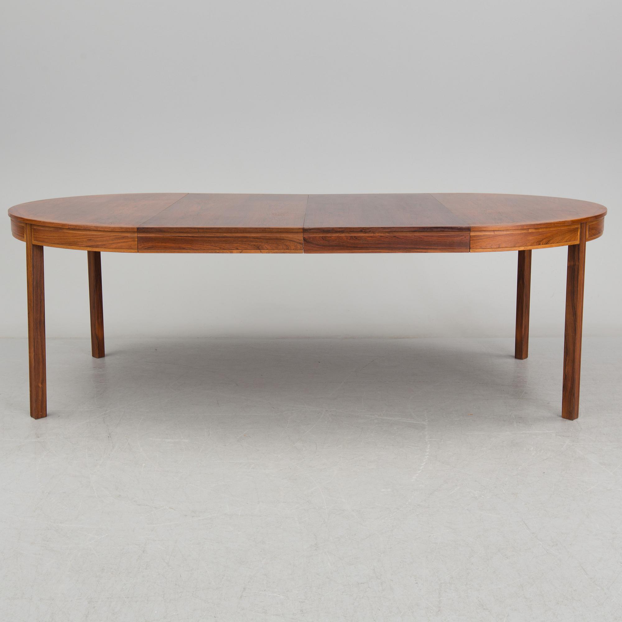 A rosewood dining table by Bertil Fridhagen for Bodafors.