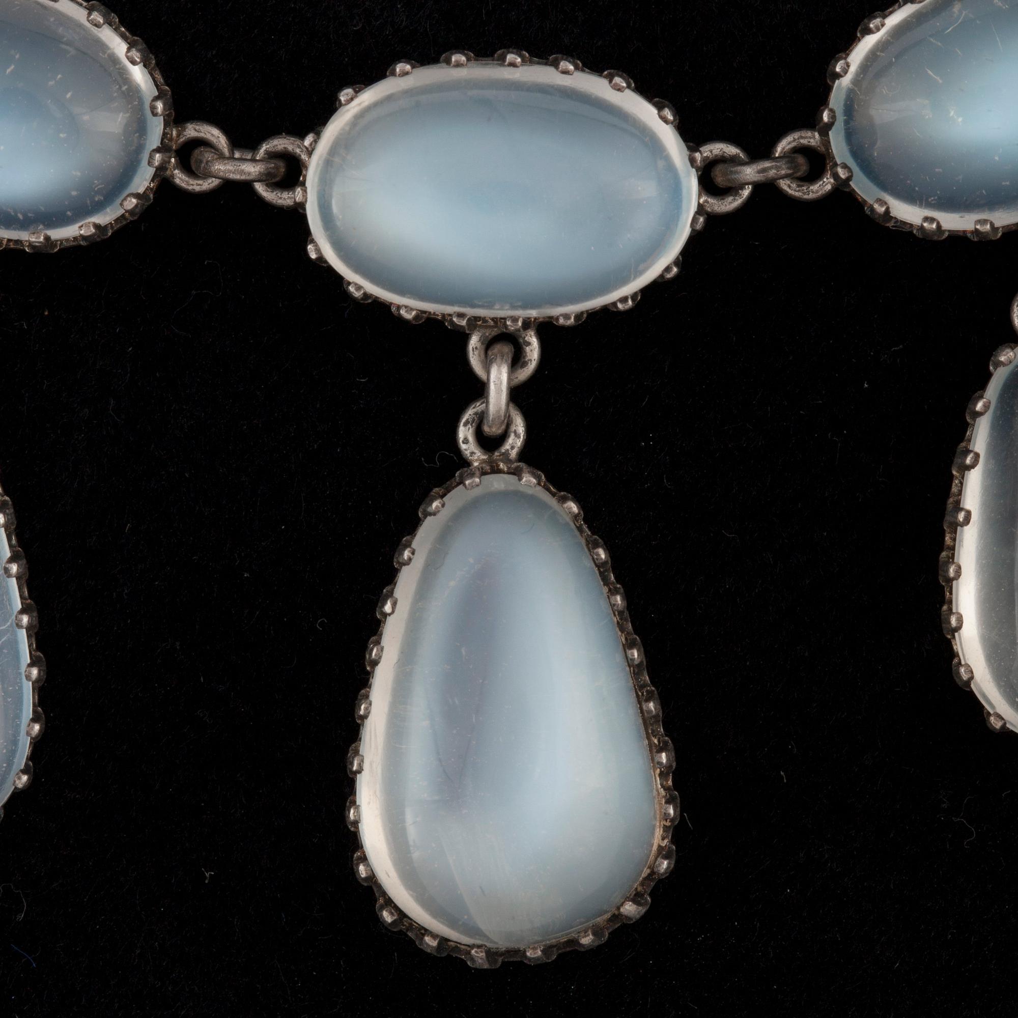 A cabochon-cut moonstone necklace. Made by C G Hallberg, Stockholm 1907.