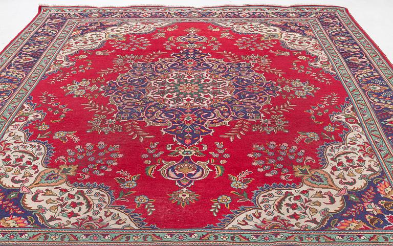 A Tabriz carpet, circa 282 x 293 cm.