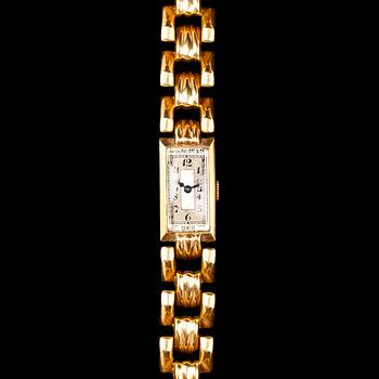 A Patek Philippe ladie's gold wrist watch.