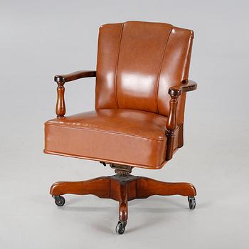 A desk chair from The Marble & Shattuck Chair Company in Ohio, around the mid 20th century.