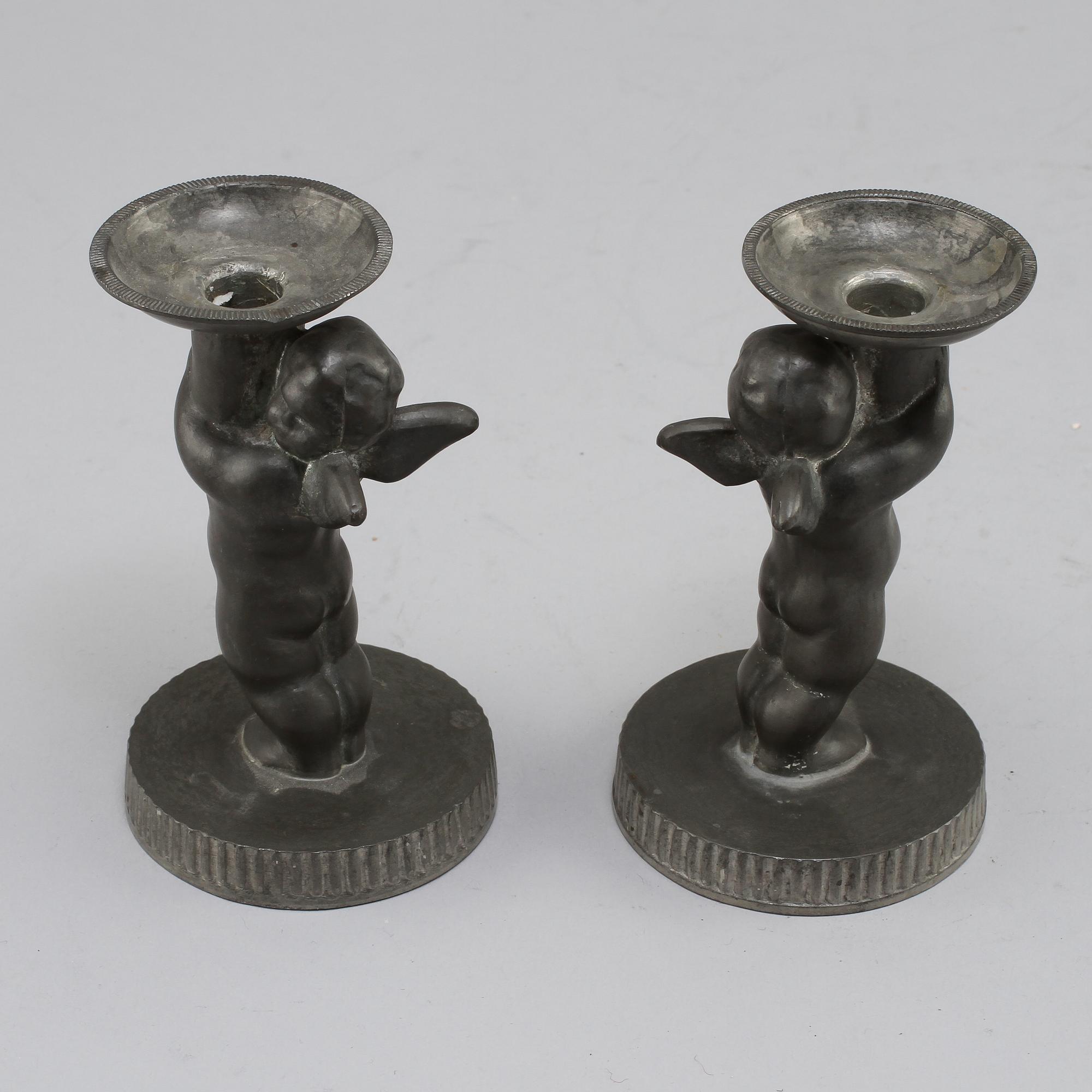 LJUSSTAKAR, ett par, tenn, Nils Fougstedt, Firma Svenskt Tenn, 1930.