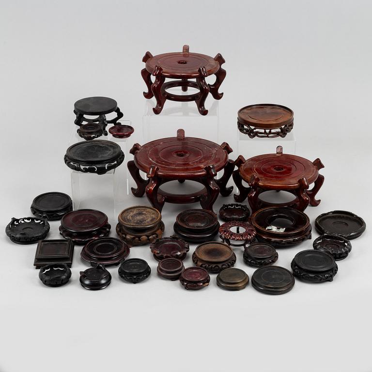 31 Chinese wooden stands of different sorts, 20th century.
