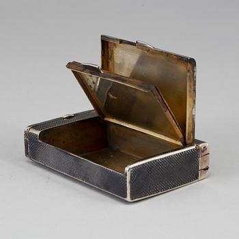 A Russian parcel-gilt silver and niello box, mark of Nicolai Kemper, Moscow 1882.