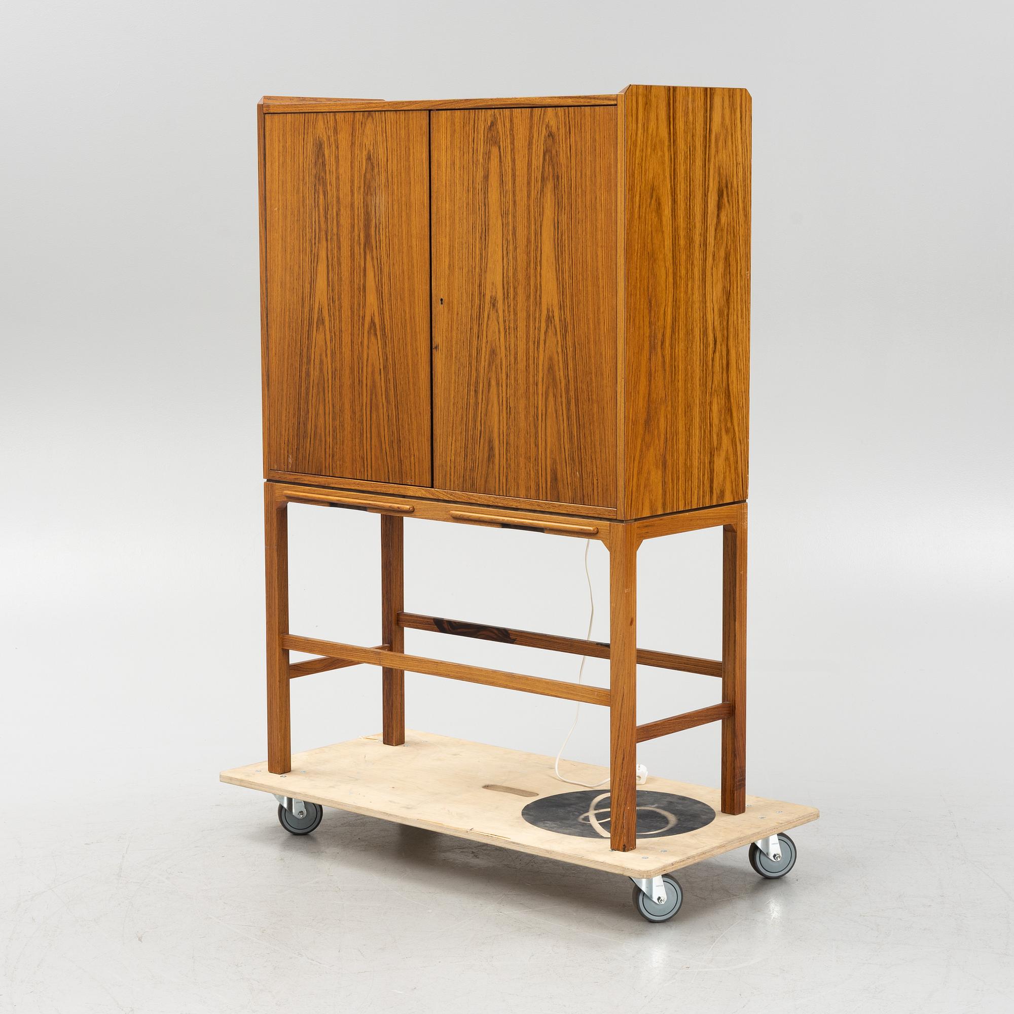 A mid 20th century bar cabinet.