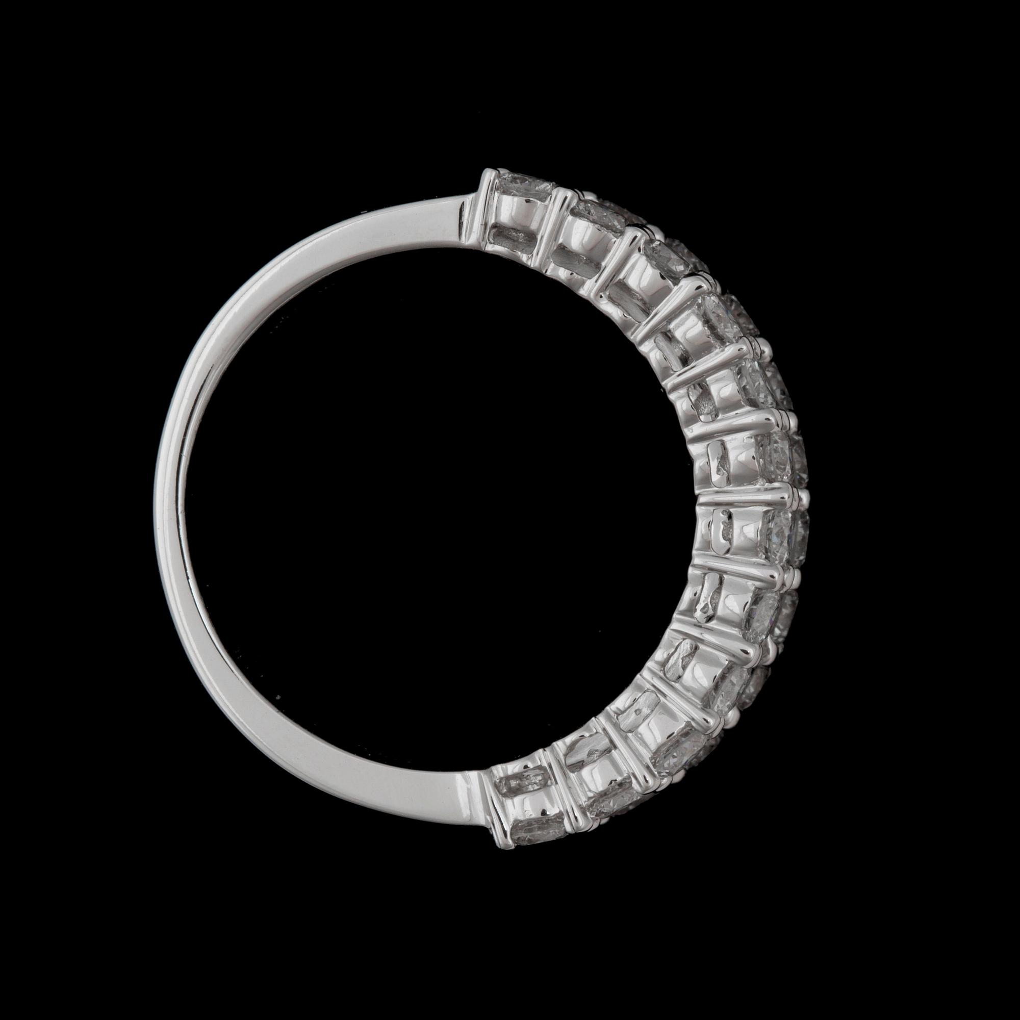 A brilliant- and emerald cut diamond ring.