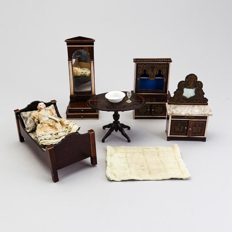 A set of ca 40 pieces of doll house furniture and accessories, including Waltershausen, Germany, 19/20th century.