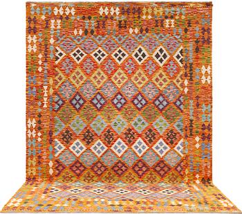 A kilim carpet, approximately 351 x 254 cm.