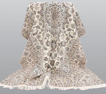 A carpet, Nain part silk s.k 6LAA, ca 310 X 209 cm.