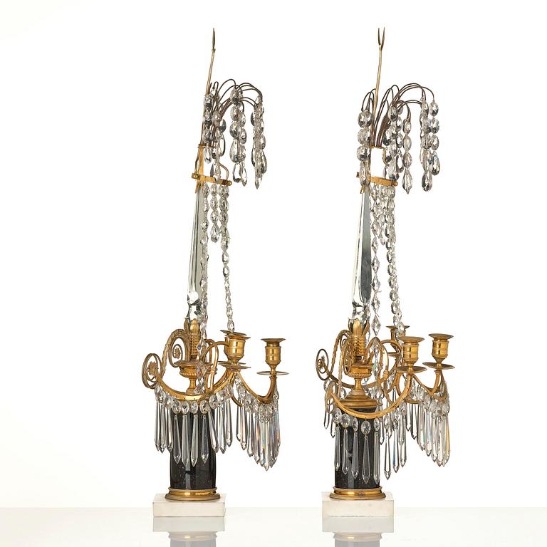A pair of late Gustavian ormolu and marble three-light candelabra, Stockholm, late 18th century.