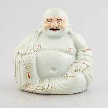 A Chinese porcelain figure of a Budai, 20th century.