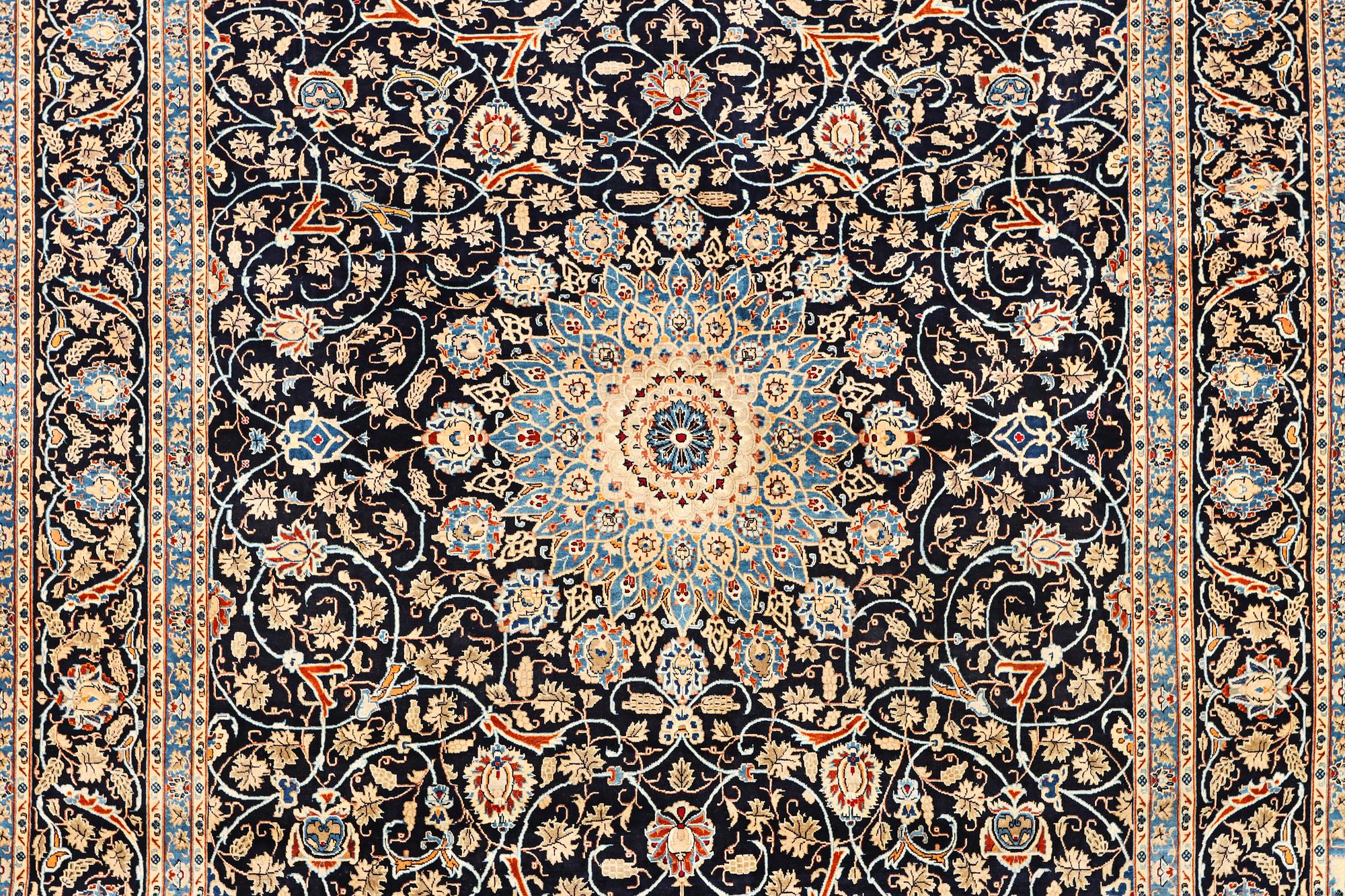 A Kashan carpet, c. 397 x 300 cm.