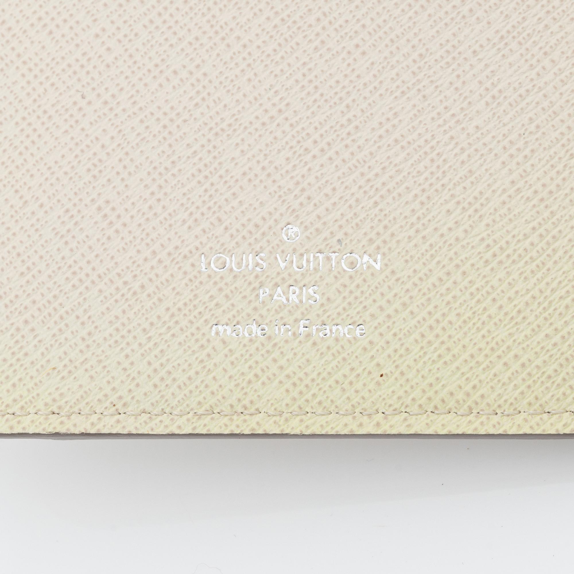 Louis Vuitton, a cream epi long wallet, 2007.