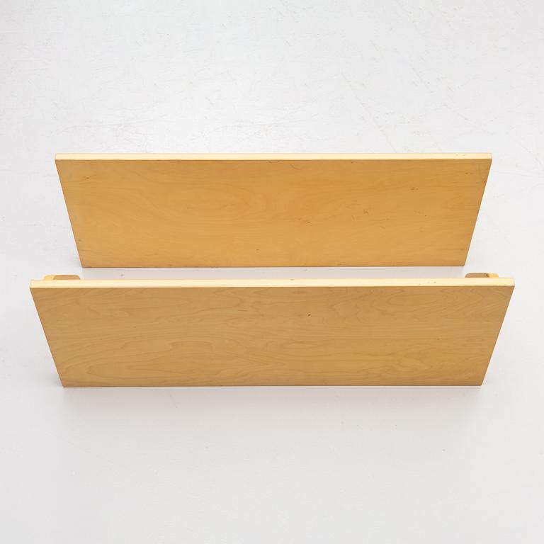 Alvar Aalto, a pair of wall shelves, model 112A, Artek, Finland, late 20th Century.